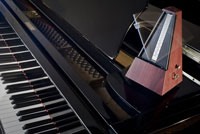Piano and metronome dreamstime xl 28299858
